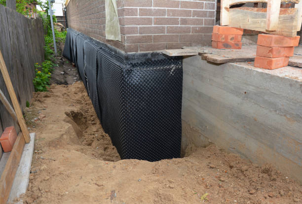 Happy homeowners after waterproofing job in Richmond